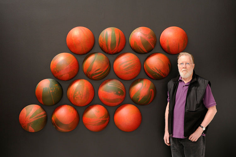 Photo of Adrian Saxe next to 4 squared - Chrome Crystalline Array, 1968